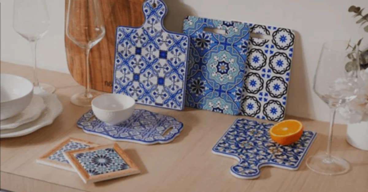 A trivet is a small, heat-resistant object used to protect surfaces from heat damage. It is typically placed under hot cookware, such as pots, pans.