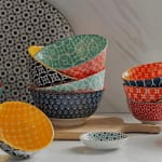 ceramic mixing bowls are kitchen utensils made from ceramic materials, typically clay, that is used for mixing ingredients during cooking or baking
