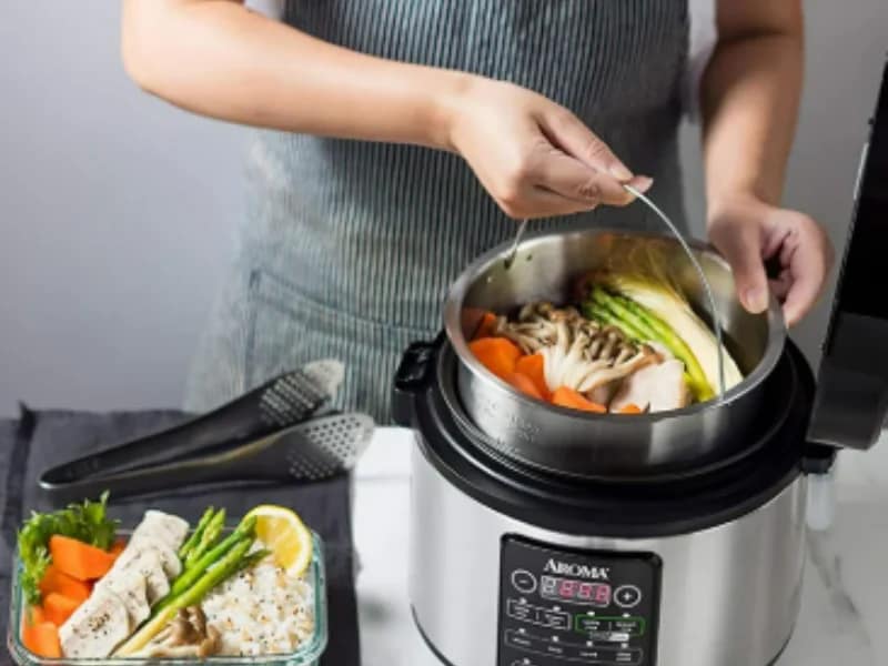 Aroma Rice Cooker is a kitchen tool used for s making steam vegies