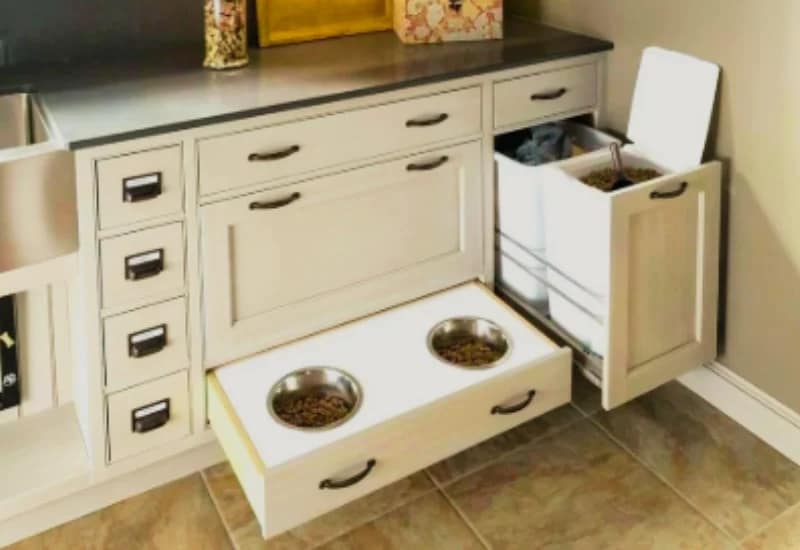 Dog Feed Bowl setup integrated into a kitchen drawer feeding station with food storage.